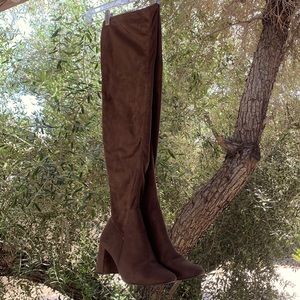 Brown faux suede boots.